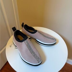 Stuart Weitzman Black Slip-On Loafers with Gold Logo